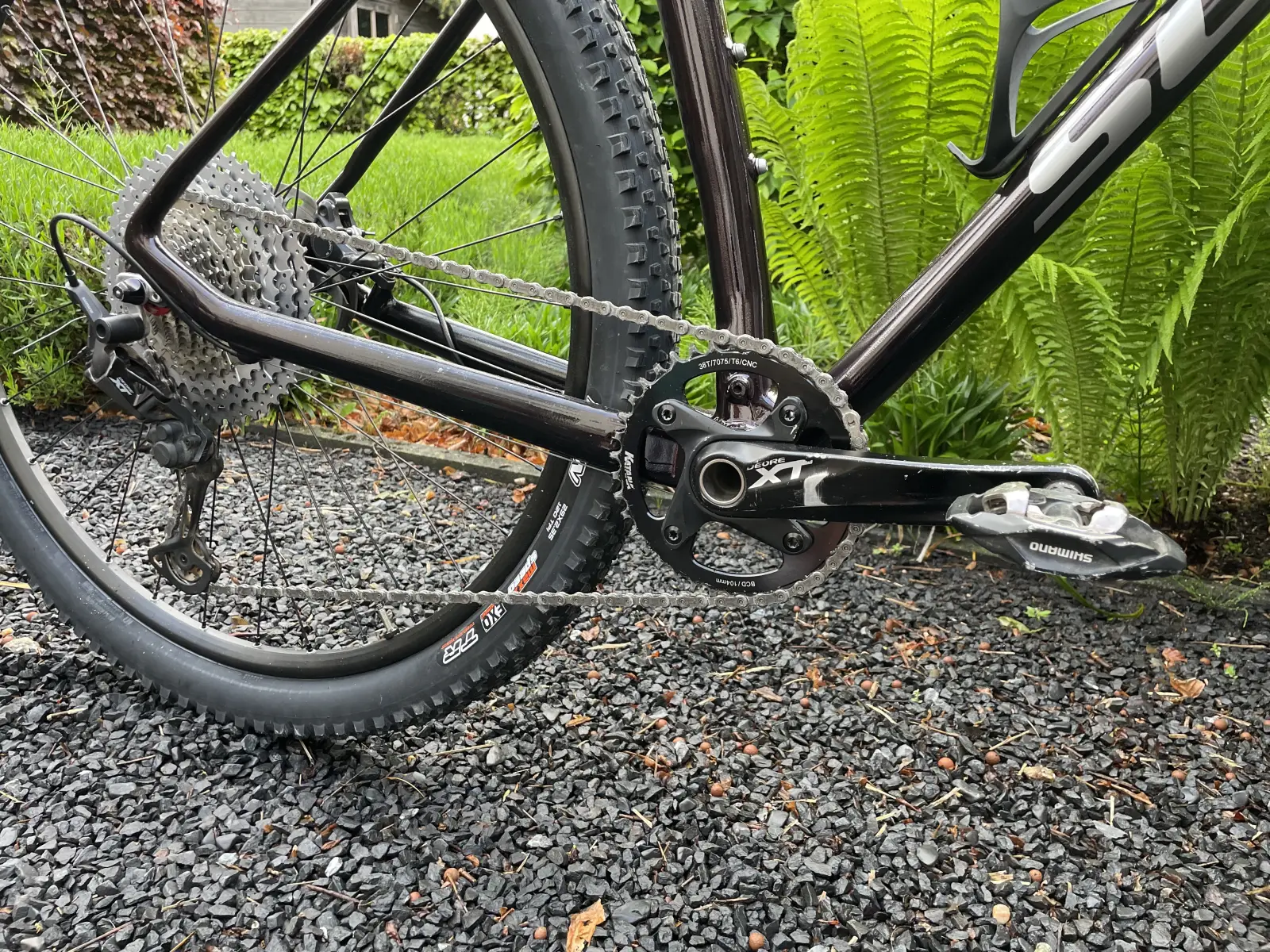Drivetrain — XT crank with 38T ring, modded XT mech, SunTour cassette