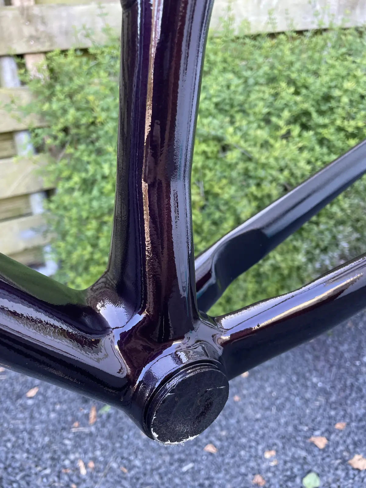 Clear-coated frame, close-up of the bottom bracket area in Montana Black