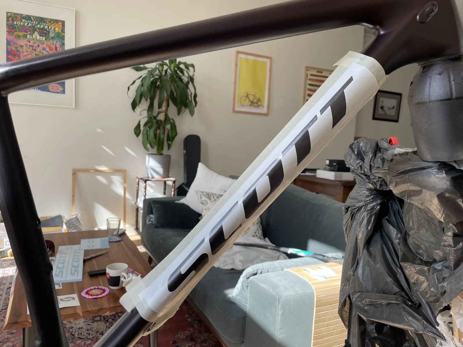 SCOTT stencil taped onto the down-tube before masking