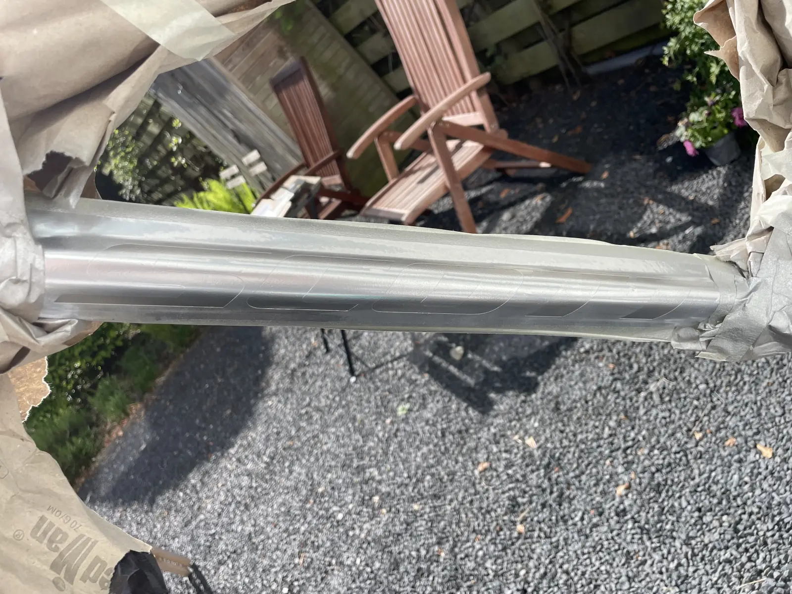Close-up of the chrome SCOTT decal on the down-tube